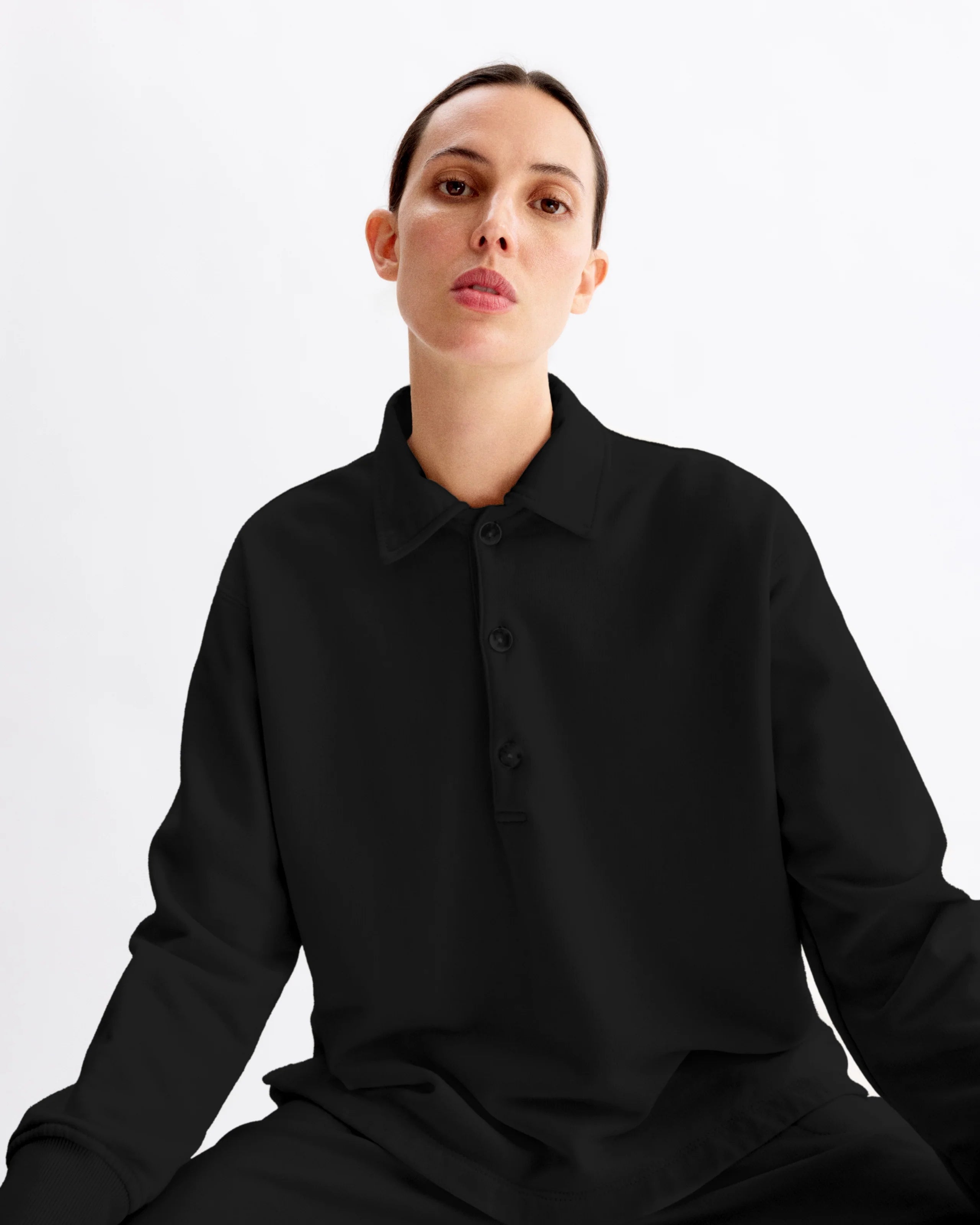 ELLIOT POLO PULLOVER IN BLACK