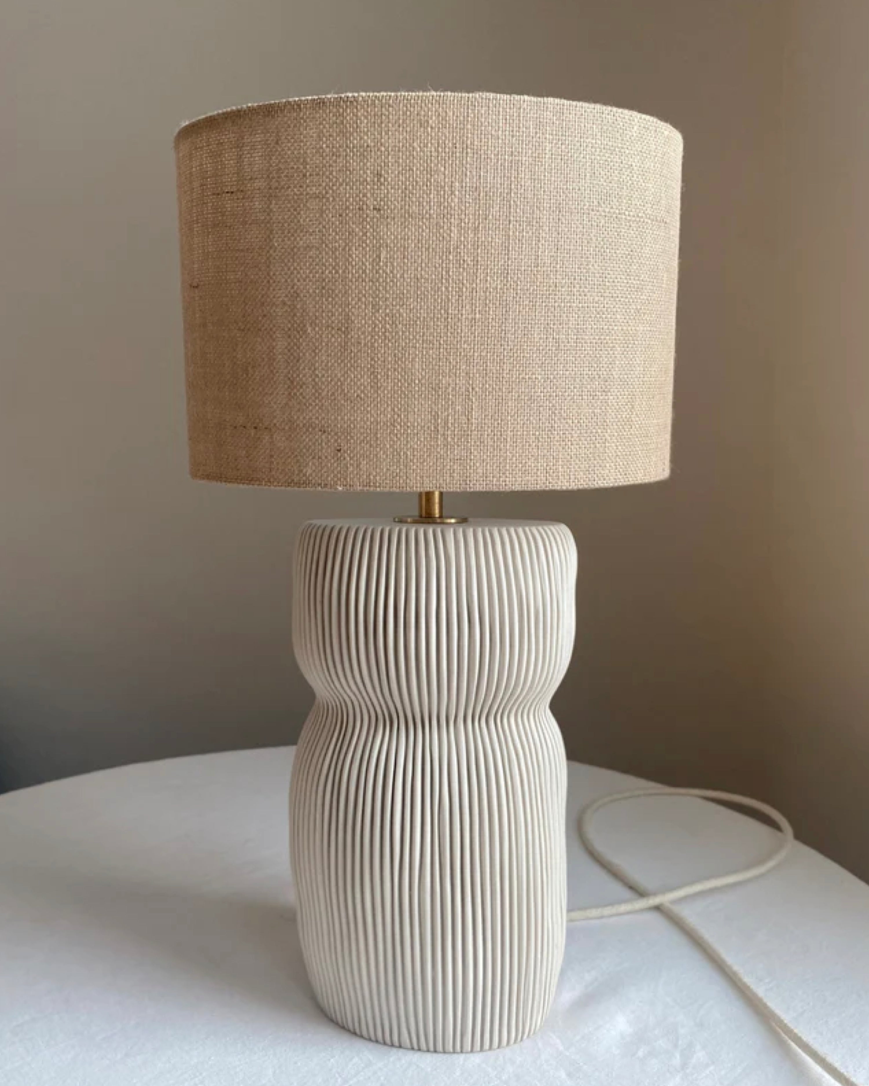 OVAL CURVY TABLE LAMP WHITE WITH BURLAP SHADE
