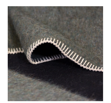THE SIEMPRE RECYCLED BLANKET IN SURPLUS